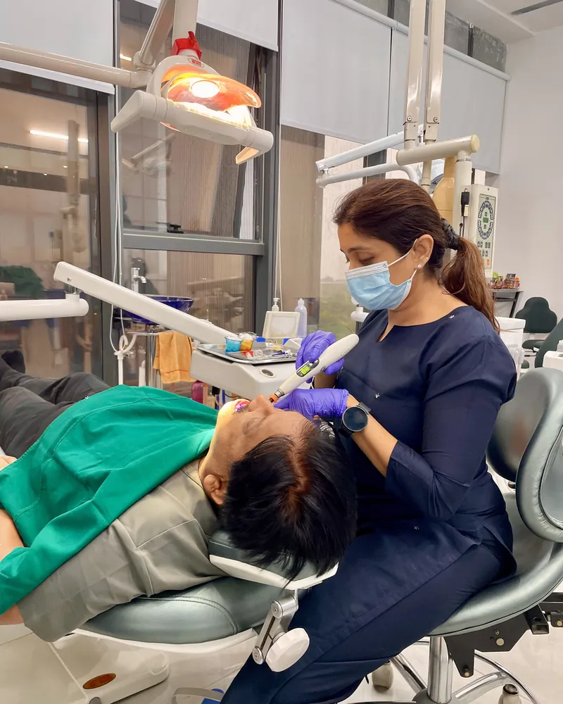 A dental check-up in progress in the operatory at Viman Nagar